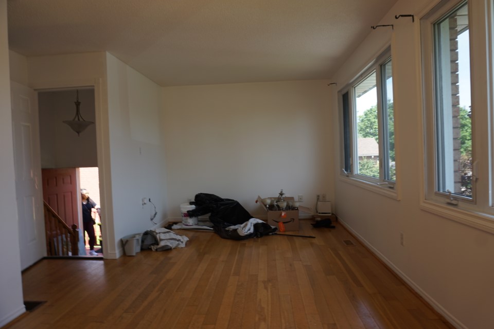 Before staging photo of a Peterborough home showing a room before professional real estate preparation.